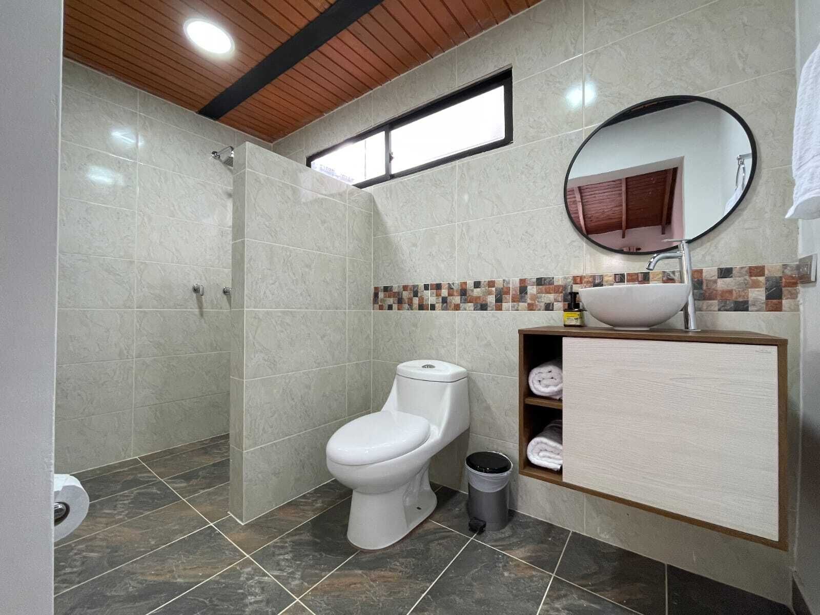 Hair dryer, towels, soap, toilet paper