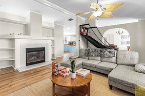 Smart TV, fireplace, table football, books