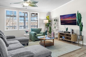 Smart TV, fireplace, table football, books
