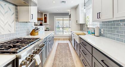 Stunning waterfront home on the canal with large yard & covered patio