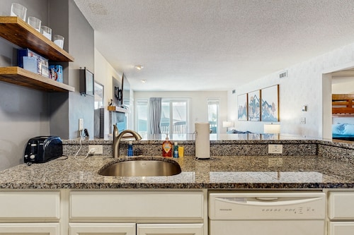 Ski-in/out mountainside condo w/ mountain views, private deck, fireplace, w/d