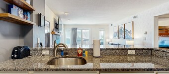 Ski-in/out mountainside condo w/ mountain views, private deck, fireplace, w/d