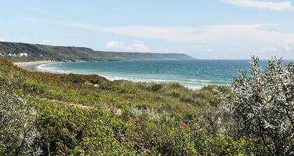 A charming bungalow in Port Eynon, Gower, just minutes from the beach.