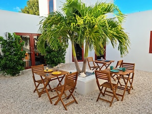 Outdoor dining - Cozy 1-bedroom apartment in charming Long Bay Hills with WiFi, AC (Long Bay Hills)