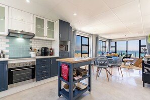 Fridge, microwave, oven, stovetop - Beachfront Bliss with Pool & Ocean Views (Cape Town)