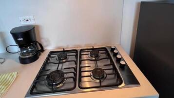 Microwave, coffee/tea maker, cookware/dishes/utensils