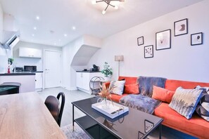 Comfort Apartment, 2 Bedrooms, City View | Living area | 42-inch Smart TV with digital channels