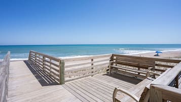 On the beach, sun loungers, beach towels