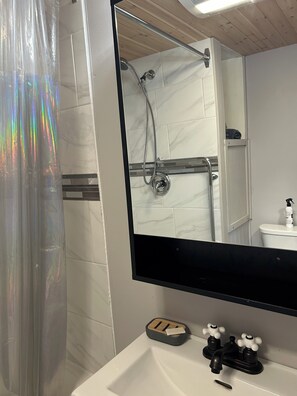 Hair dryer, towels, soap, toilet paper