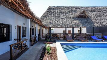 Deluxe Triple Room, Patio, Garden View | Terrace/patio