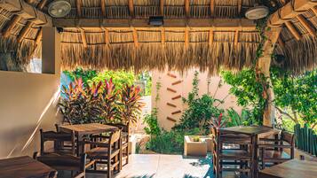 Breakfast, lunch, dinner served; Fusion cuisine, pool views