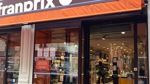 A storefront with a sign reading "franprix." - The Poet - Bright and Spacious by Mon Petit Faré (Paris)