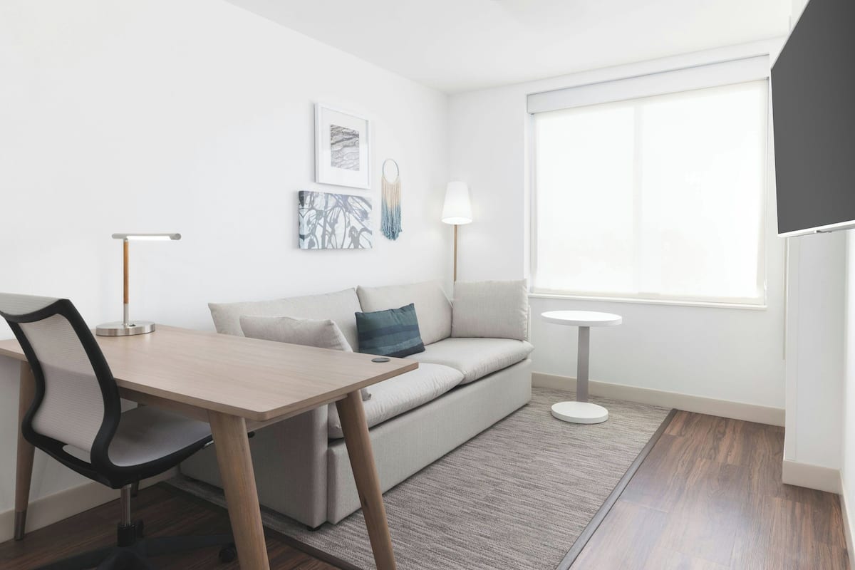 Suite, 1 Bedroom | 1 bedroom, desk, iron/ironing board, free WiFi