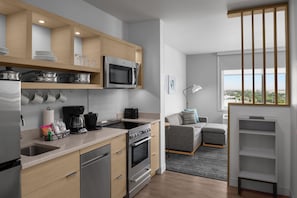 Fridge, microwave, stovetop, coffee/tea maker