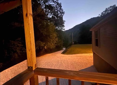 Property grounds. Nice private home in Matewan, close to trails! Hottub, Pool, fire pits & games!