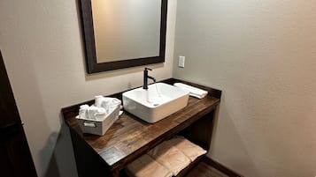 Hair dryer, towels, soap, toilet paper