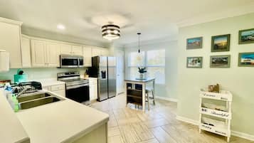 Townhome, Multiple Beds, Patio, Garden View | Private kitchen | Coffee/tea maker