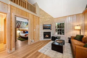 Standard Suite, 1 Queen Bed, Ground Floor | Living area | 55-inch Smart TV with cable channels - Spruce and Shore Motel (Fish Creek)