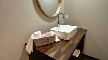 Hair dryer, towels, soap, toilet paper