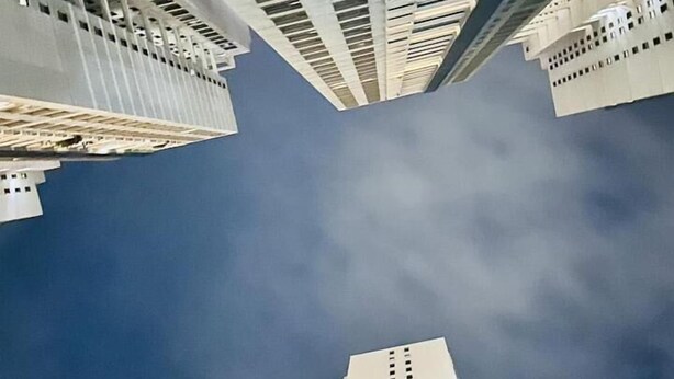 A view of tall buildings with a clear sky and a few clouds. - Monaara Leisure colombo 03 (Colombo)
