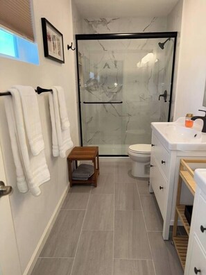 Shower, eco-friendly toiletries, hair dryer, soap