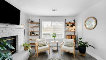 Smart TV, fireplace, video games, foosball