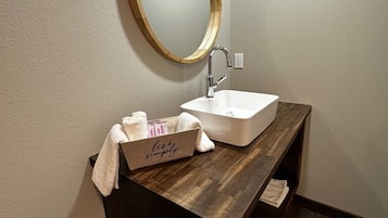 Hair dryer, towels, soap, toilet paper