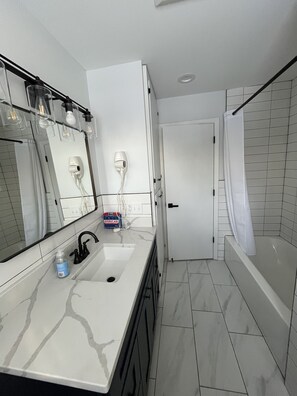 Hair dryer, towels, soap, toilet paper