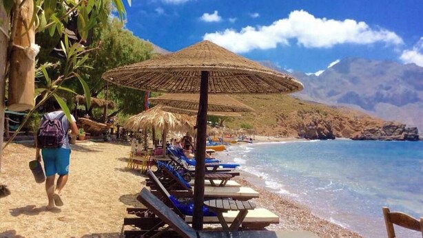 A beach with thatched umbrellas, wooden lounge chairs, and a clear view of the sea. - Entire Villa in Kalymnos, Greece
5 guests1 bedroom3 beds1.5 bathrooms (Kalymnos)