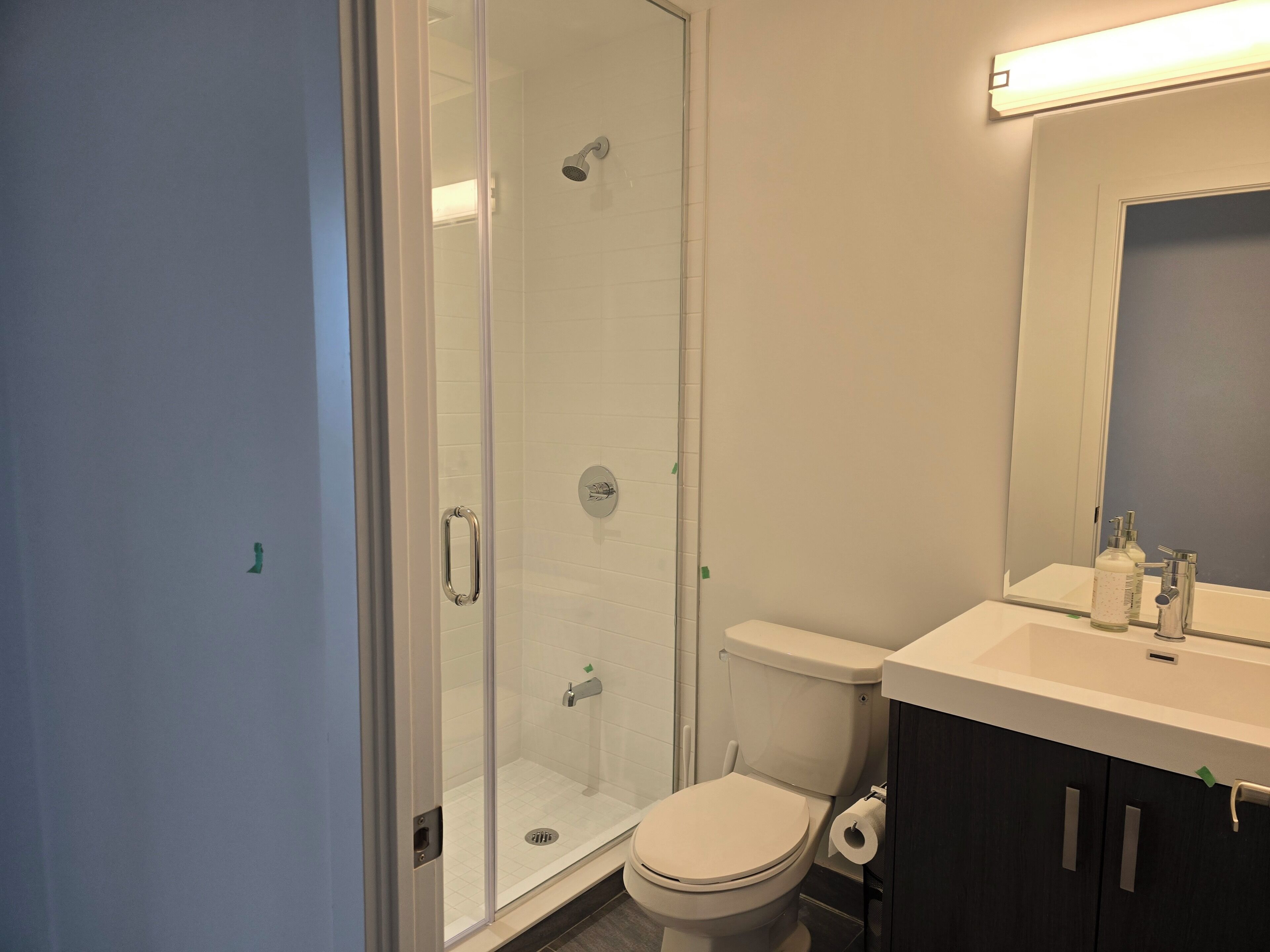 Shower, towels, soap, toilet paper