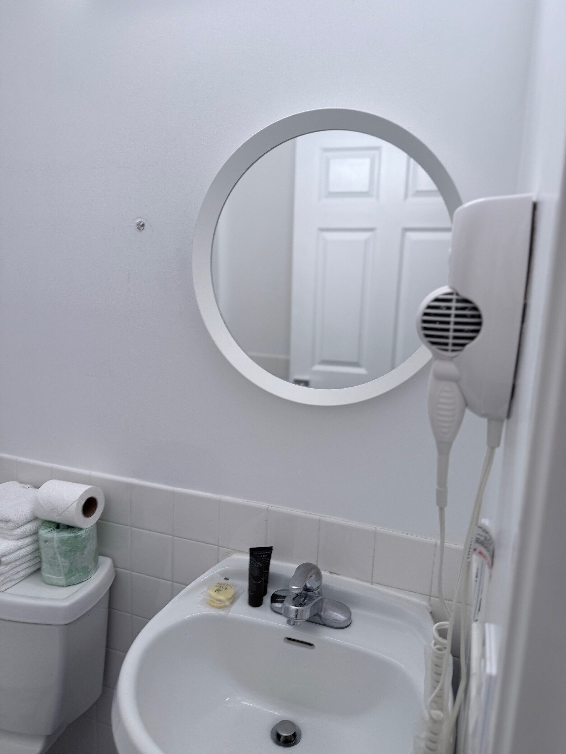 Hair dryer, towels, soap, toilet paper