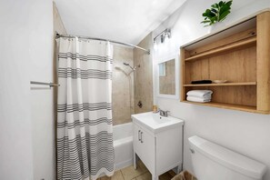 Hair dryer, towels, soap, shampoo