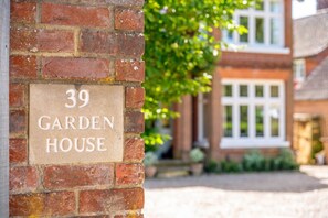 Welcome to 39 Garden House, a charming residence with a distinctive entrance.