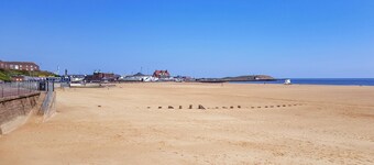 Sea Breeze is a delightful large family house a short stroll to the beach.