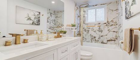 Hair dryer, towels, soap, toilet paper