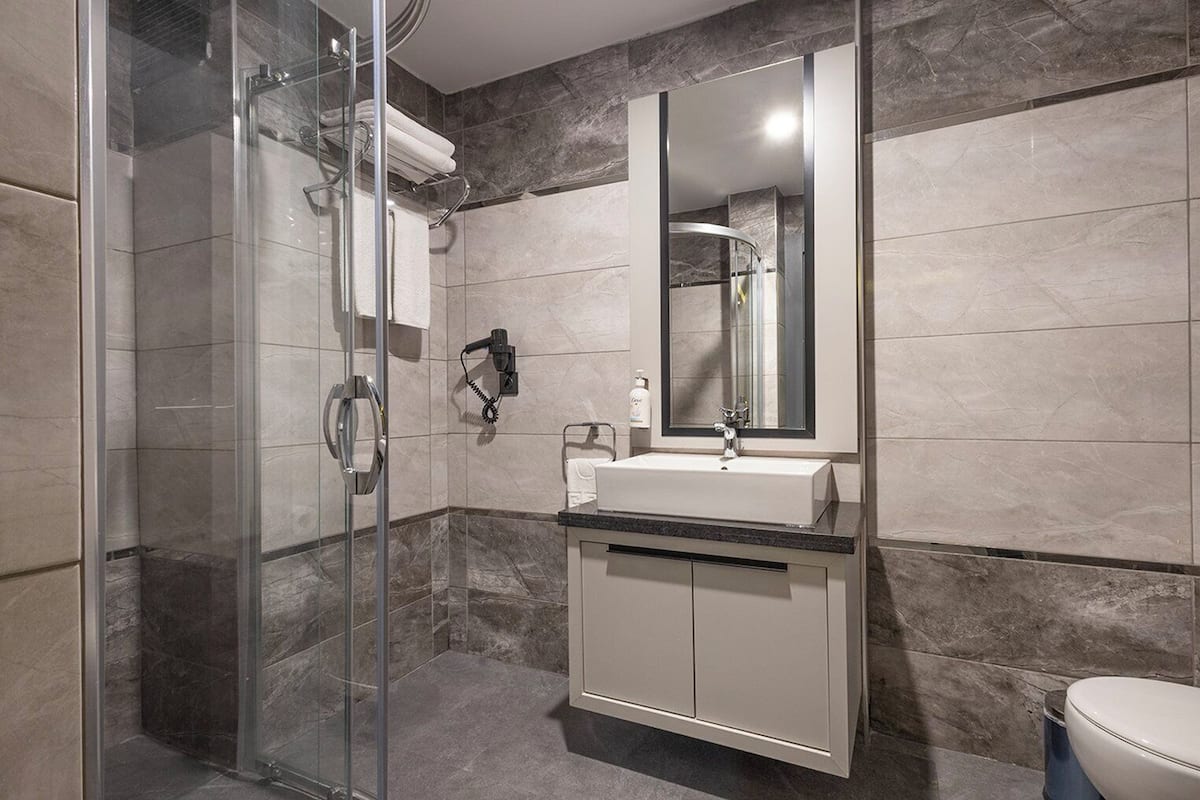 Premium Room, 2 Twin Beds | Bathroom | Shower, free toiletries, hair dryer, slippers