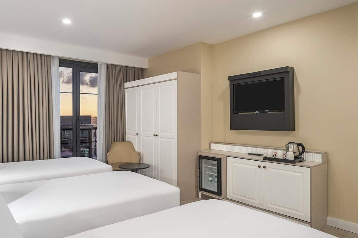 Chambre Premium, 3 lits une place