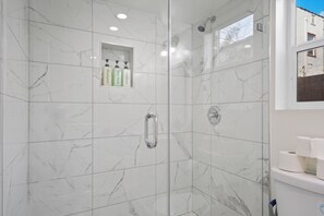 Shower, hair dryer, towels, soap