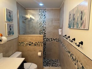 Shower, hair dryer, towels, soap