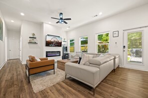 Smart TV, fireplace, table football, computer monitors