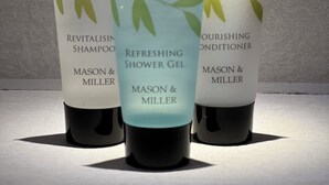 Three Mason & Miller products: Revitalising Shampoo, Refreshing Shower Gel, and Nourishing Conditioner. - Charming 2-bedroom apartment with WiFi in London (London)