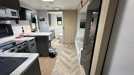 Individually decorated, individually furnished, laptop workspace. Pitmaster RV Park