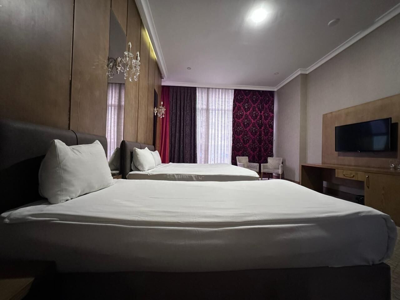 Comfort Triple Room, City View | In-room safe, individually decorated, individually furnished, desk