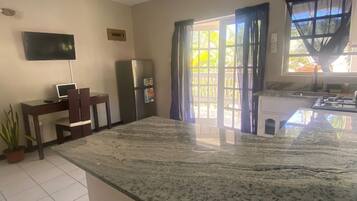 Family Double Room, 2 Bedrooms | Living area | TV