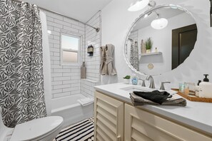 Hair dryer, towels, soap, toilet paper