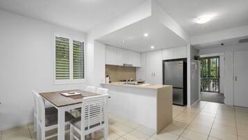 Apartment, 3 Bedrooms, Pool View | Private kitchen | Coffee/tea maker, electric kettle, toaster, cleaning supplies