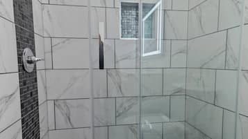 Shower, towels, soap, shampoo