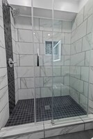 Shower, towels, soap, shampoo