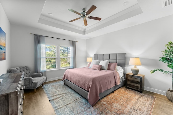 Relax in a king bed with luxury linens, a Smart TV, and cozy vibes