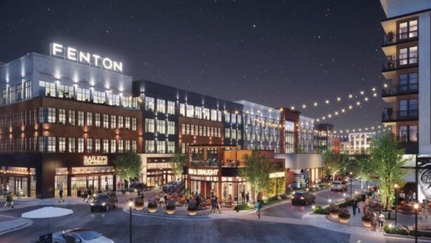 A modern building with a prominent 'FENTON' sign, surrounded by a lively urban street scene with pedestrians and vehicles. - Groovy Cary Crib - Pickleball, Pets & Plug-In 4 EV (Cary)
